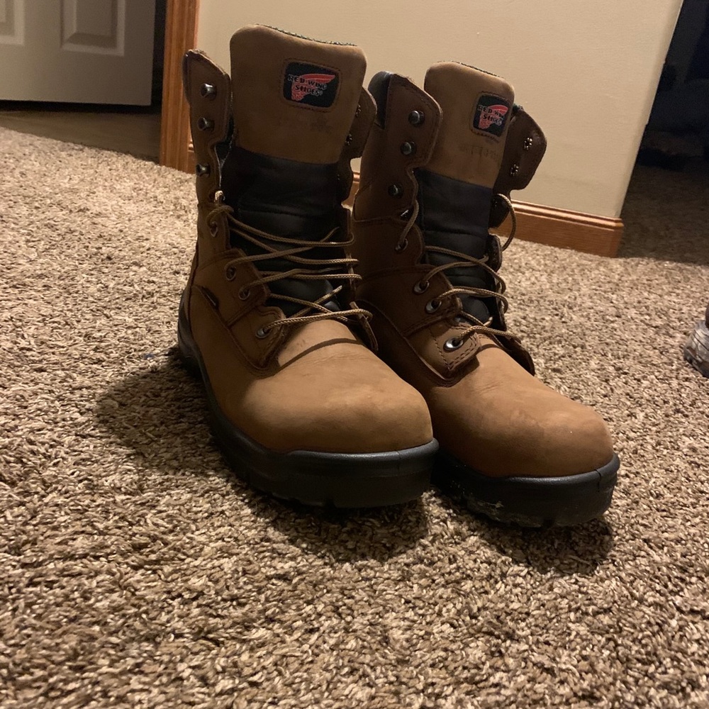 “Red Wing Shoes” work boots with steel toe.